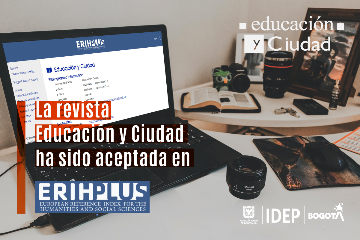 Fondo de un escritorio y un portatil mostrando la indexación de la revista educación y ciudad en erihplus